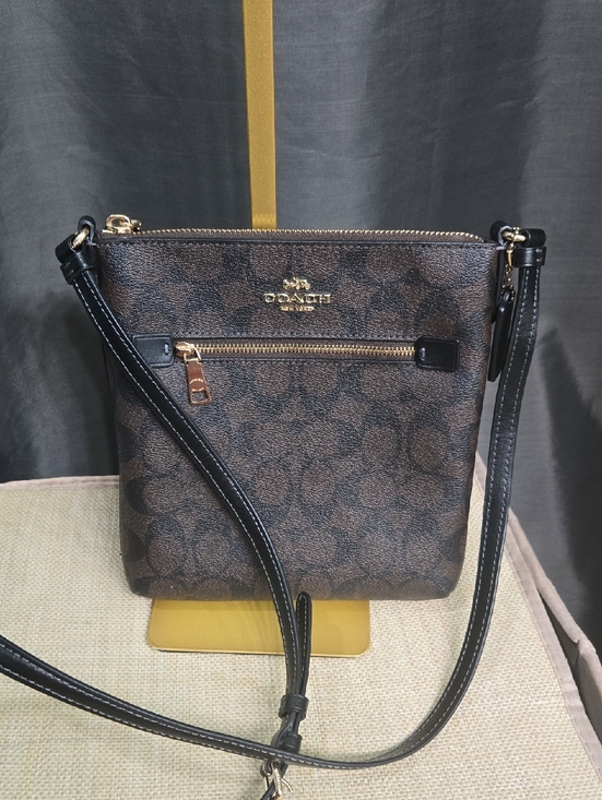 Coach Handbags - Like New! Coach Brown Signature Crossbody with Black Trim